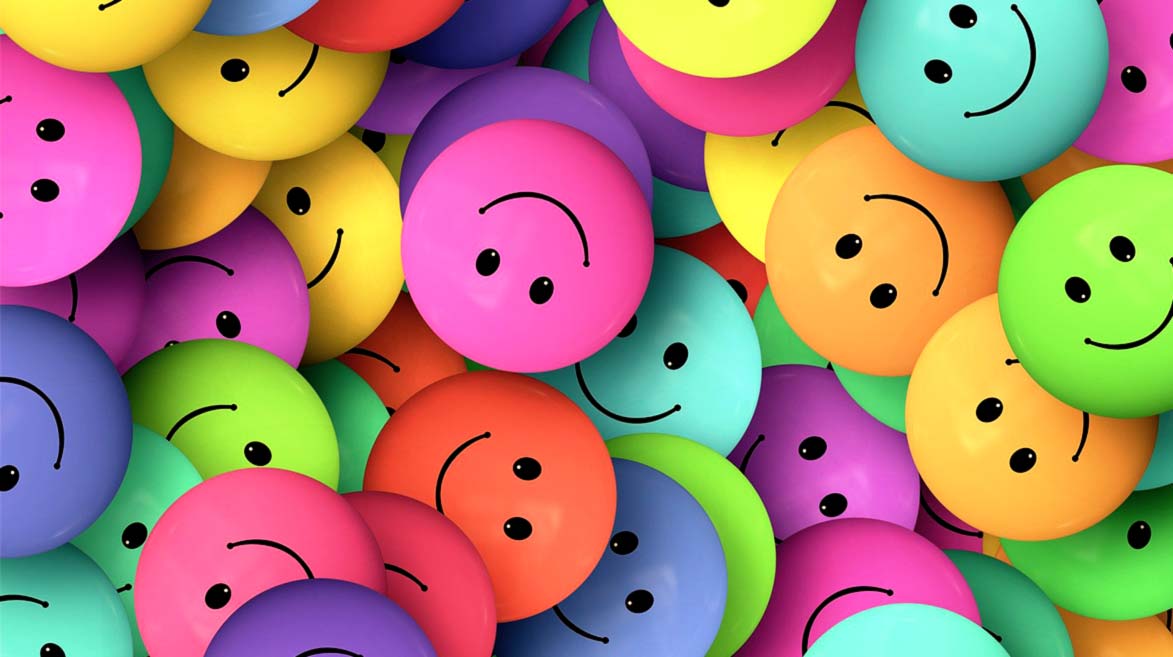 Diversos emojis sorridentes espalhados 